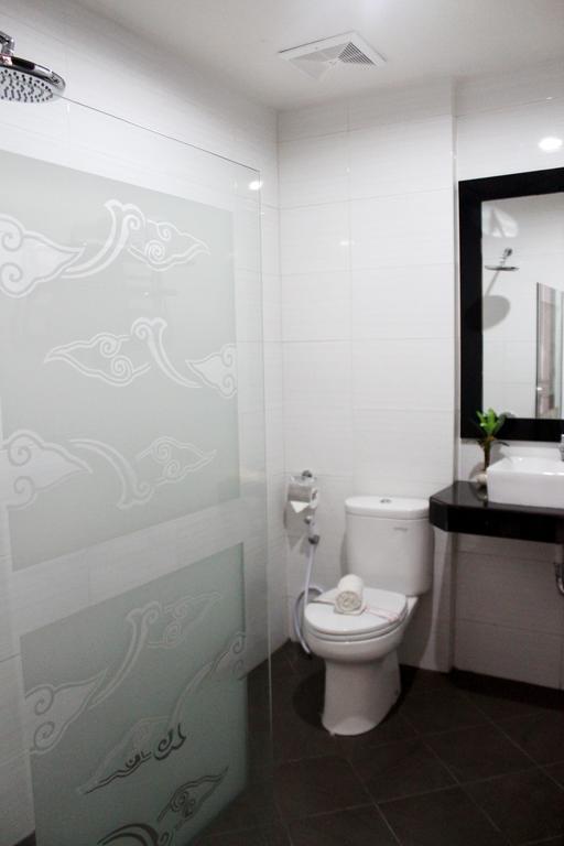 Grand Dian Boutique Hotel Чиребон Номер фото